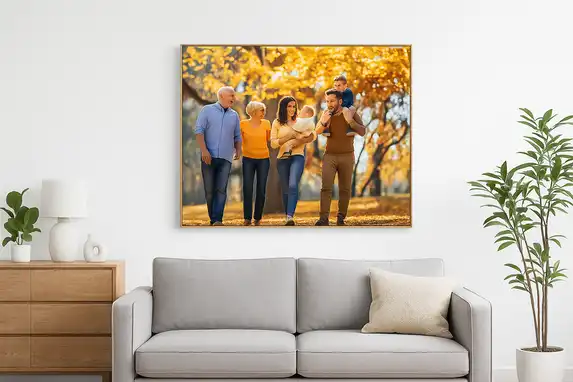 The stretched canvas in the Ayous wooden frame fits perfectly into a warm and modern living room atmosphere.
