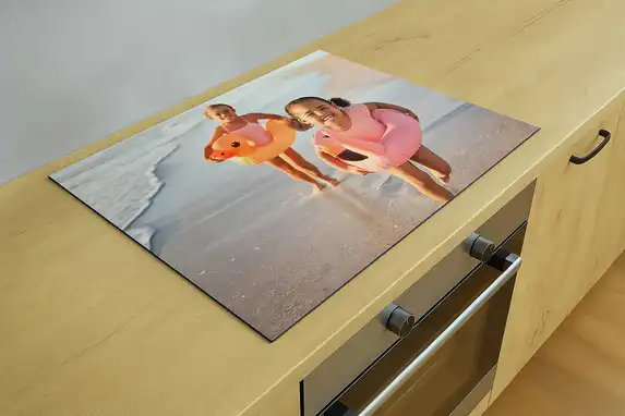 Of course, Photo Gift also prints your own photo on our induction hob protectors.