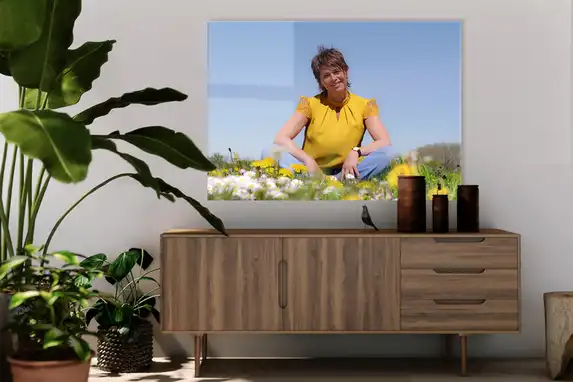 Portrait photo on plexiglass in living room.