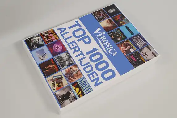 Photo puzzle with printed box, printed in editions for the Veronica Top 1000 of all time.