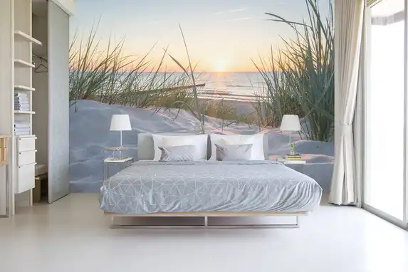 Photo wallpaper with beach and dunes is very popular as wall decoration.